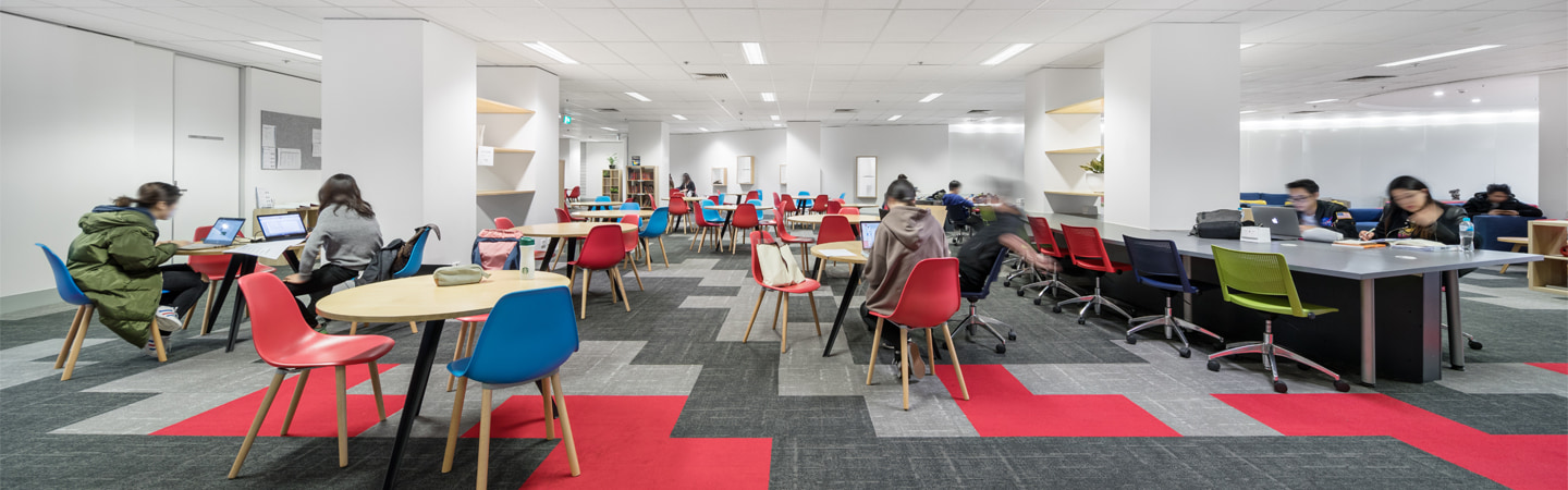 Students studying in a library in Melbourne