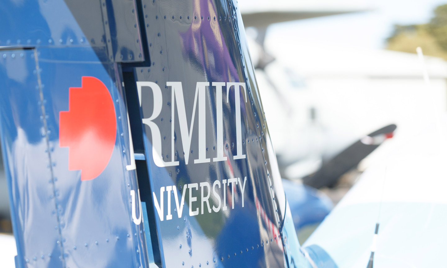 RMIT logo on plane