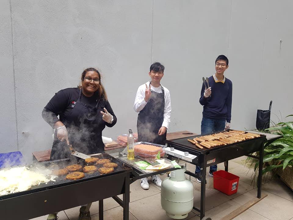 RMIT Training students cooking a bbq